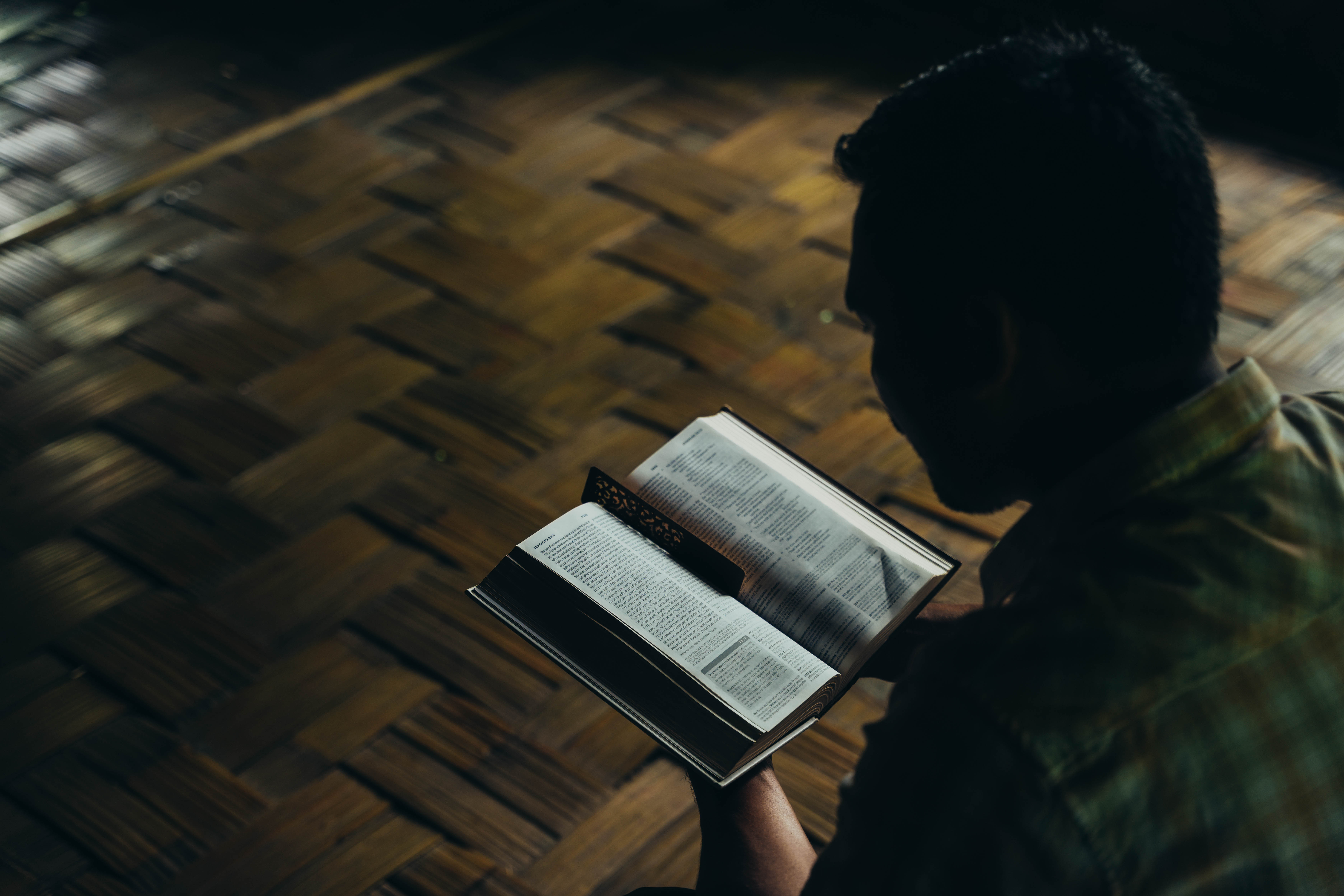 Sian reading his Bible