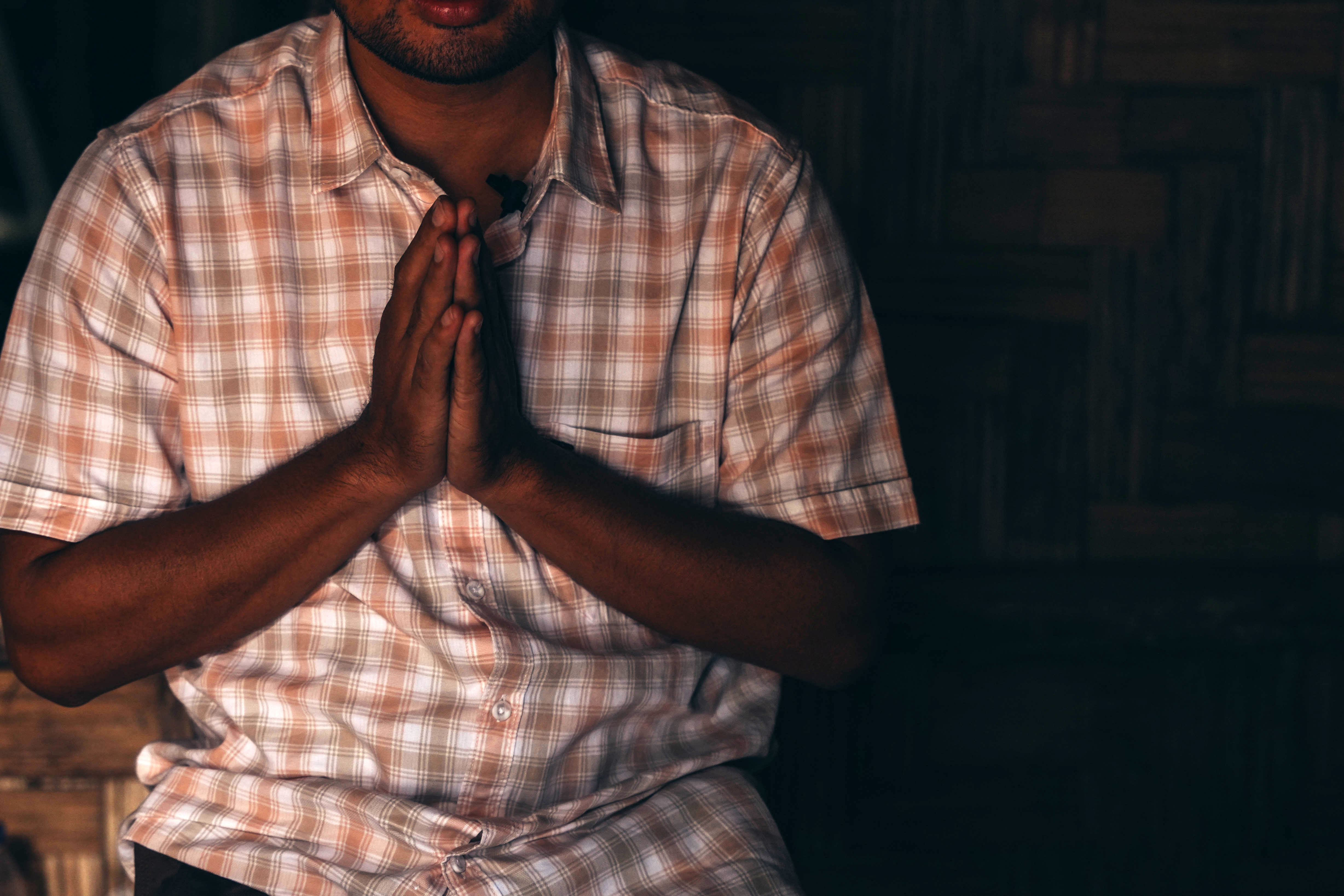 Pastor Sian praying